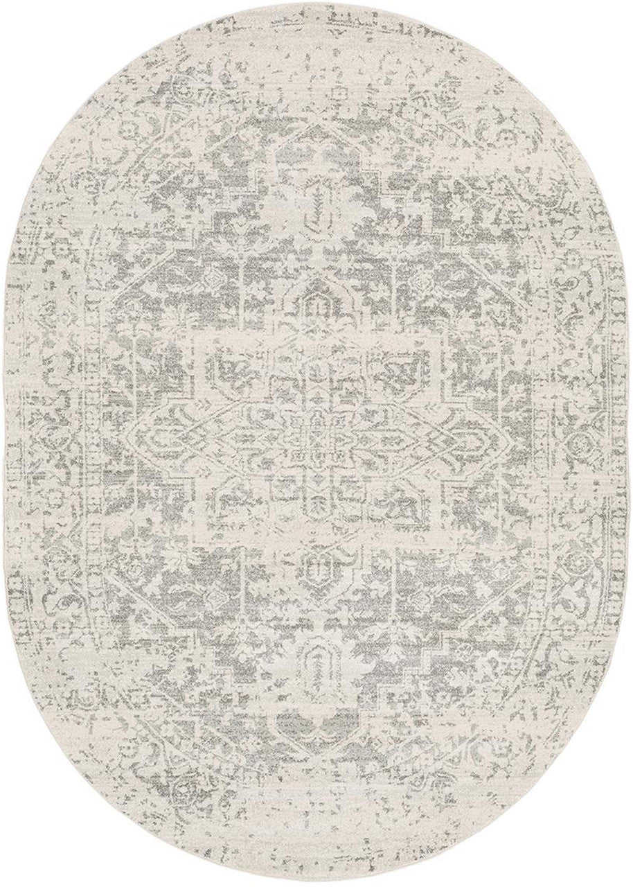 Naitee Light 6'7" x 9' Oval Rug